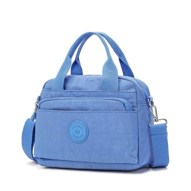 High quality women\'s portable nylon fashion casual shoulder bag crossbody bag 2023 new women\'s bag waterproof handbag 8670