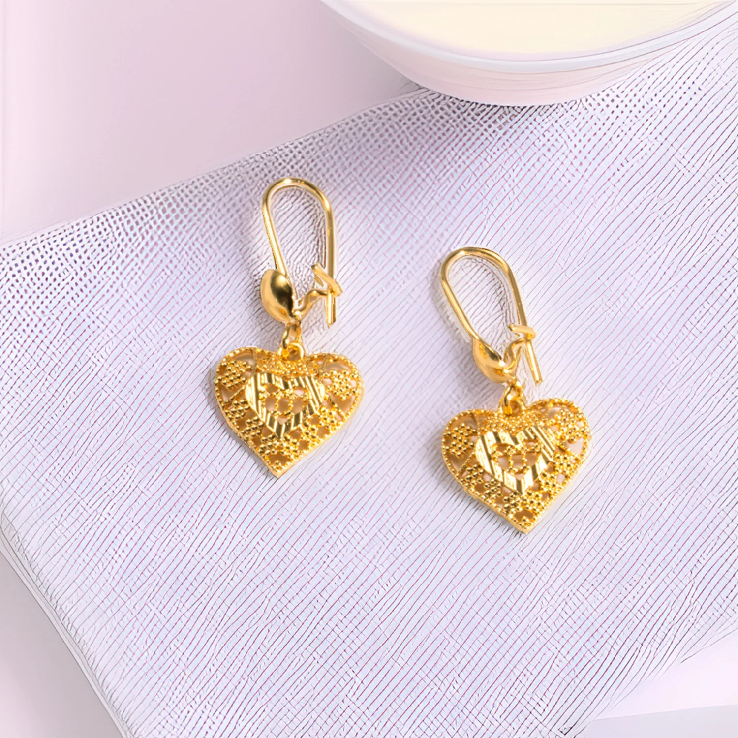 Middle East Dubai cross-border special supply imitation 24k gold fringed earrings high-end love earrings niche design earrings