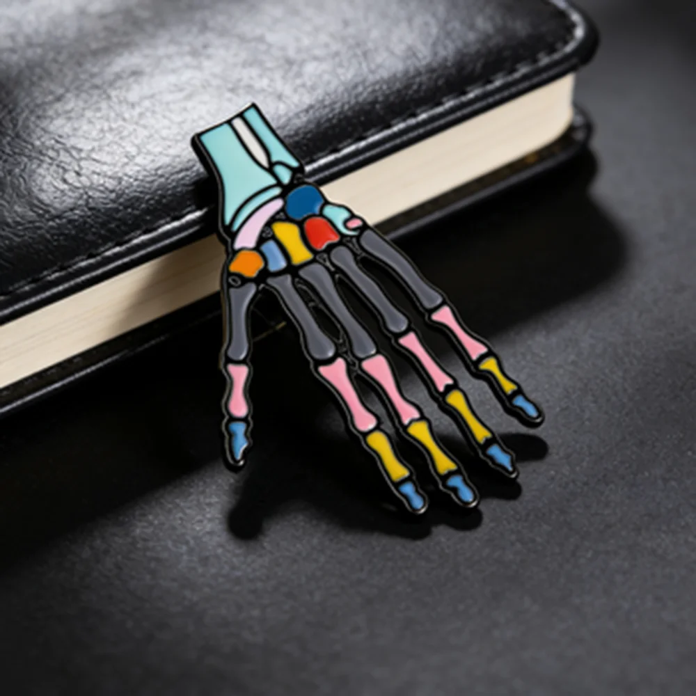 Hanreshe Metacarpal Bone Brooch Medical Orthopedics Skeleton Colorful Enamel Pin for Doctor Nurse Backpack Lapel Badge Gifts