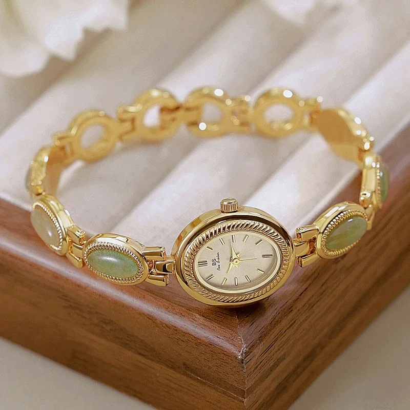 

Luxury ladies watch gold inlaid with natural Hetian jade advanced chain watch fashion elegant business quartz watch