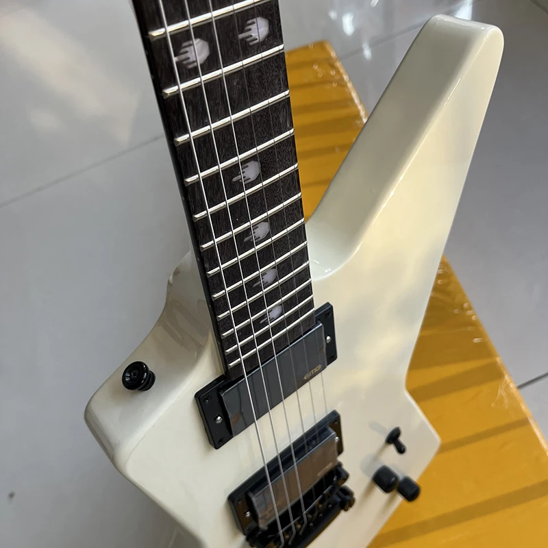 Customized shaped electric guitar, professional grade, fast delivery.