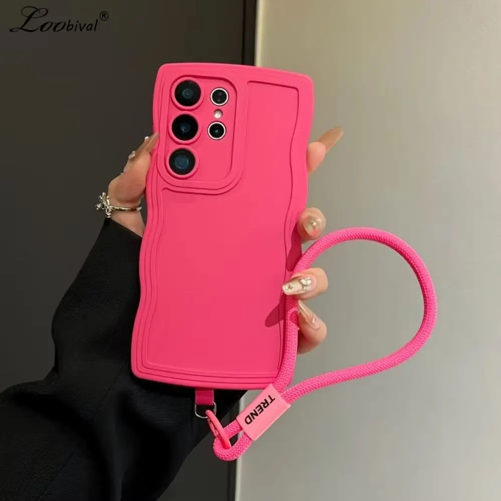 Luxuriöse Handyhülle mit Wellenrand und Handschlaufe für Samsung Galaxy S24 S25 Ultra S22 S23 Plus A56 A55 A16 A54 in Bonbonfarben