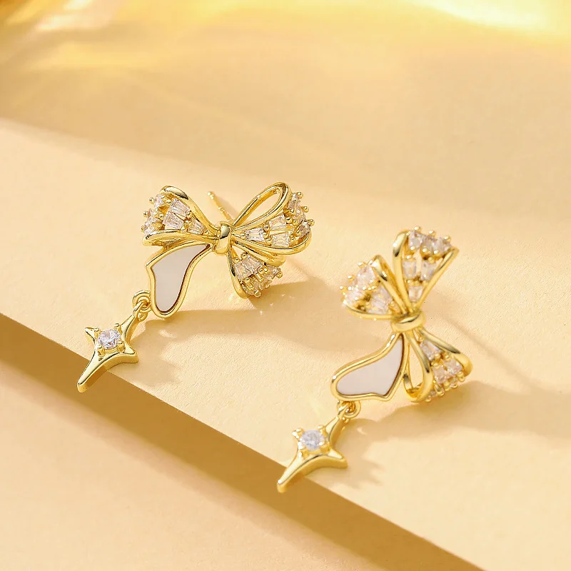 

Fashionable and super fairy sweet temperament diamond zircon shell bow tassel earrings light luxury niche high-end earrings