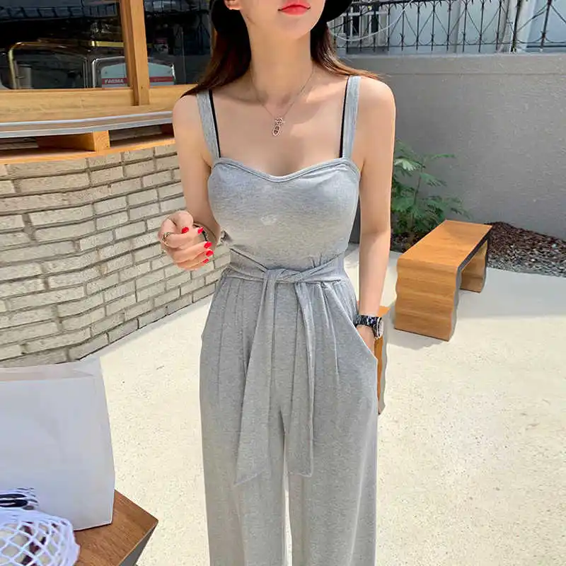 

Clothland Women Stylish Sleeveless Jumpsuits Sashes Backless One Piece Summer Casual Long Playsuits Mujer KA497