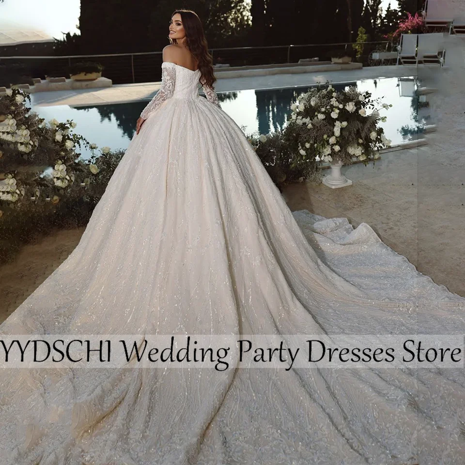 Robes de mariée 2025 Sexy longue traîne robe de mariée robe de plage exquise robe de bal robes dos nu robes de mariée pour les femmes 2025