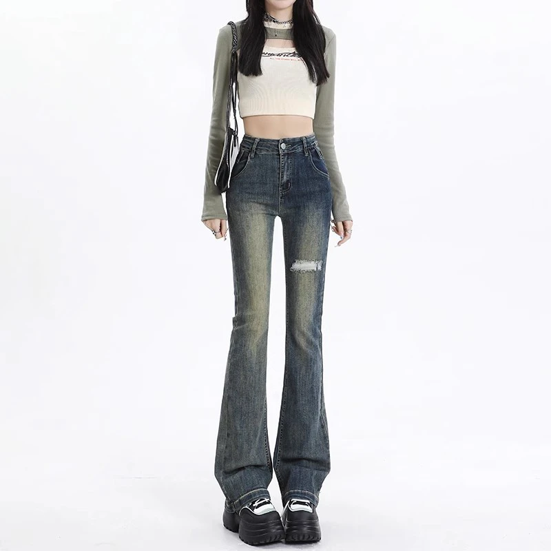 

Retro blue broken holes micro-large jeans female 2024 early spring new Spice Girls high-waisted thin straight horseshoe pants