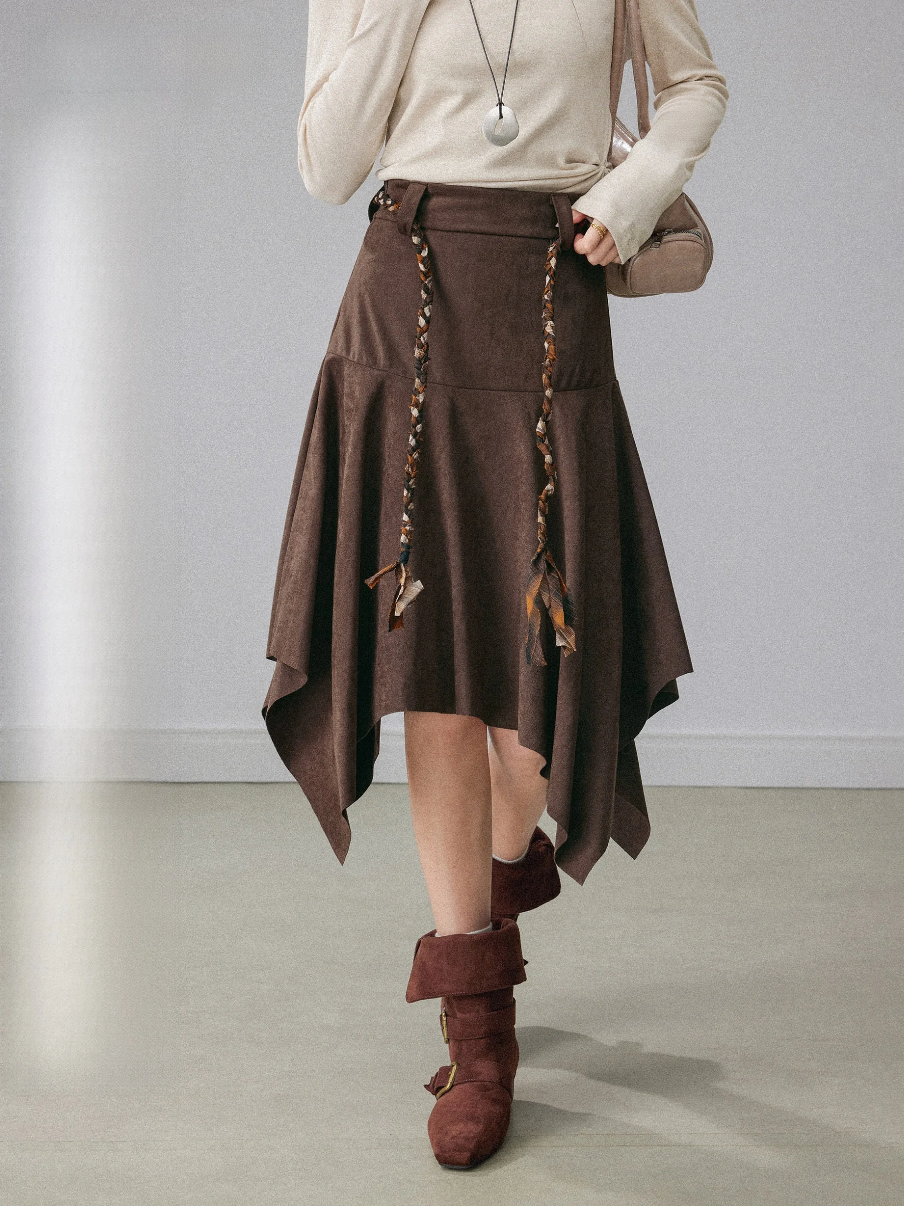 

Новая женская асимметричная миди-юбка А-силуэта с высокой талией из замши винтажного кофейного цвета, скрывающая бедра, для весеннего сезона