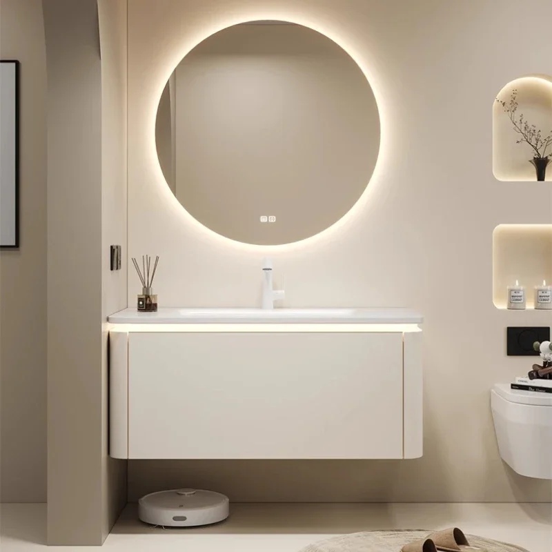 Szafka łazienkowa kremowa ceramiczna z umywalką zintegrowaną, umywalka podłogowa, lustro z motywem kreskówkowym, zestaw do mycia twarzy, meble do łazienki.