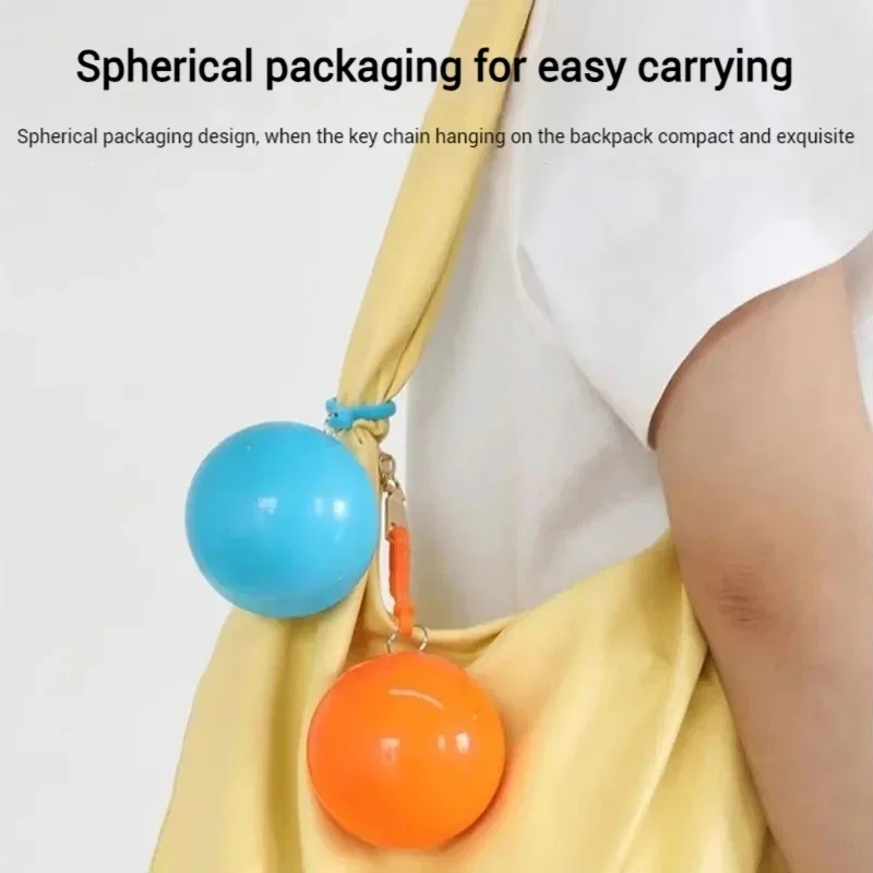 1/5 عشوائي معطف واق من المطر يستخدم لمرة واحدة المحمولة مقاوم للماء ضغط الكرة جيب معطف واق من المطر السفر في الهواء الطلق معلقة المعطف معدات التخييم #3