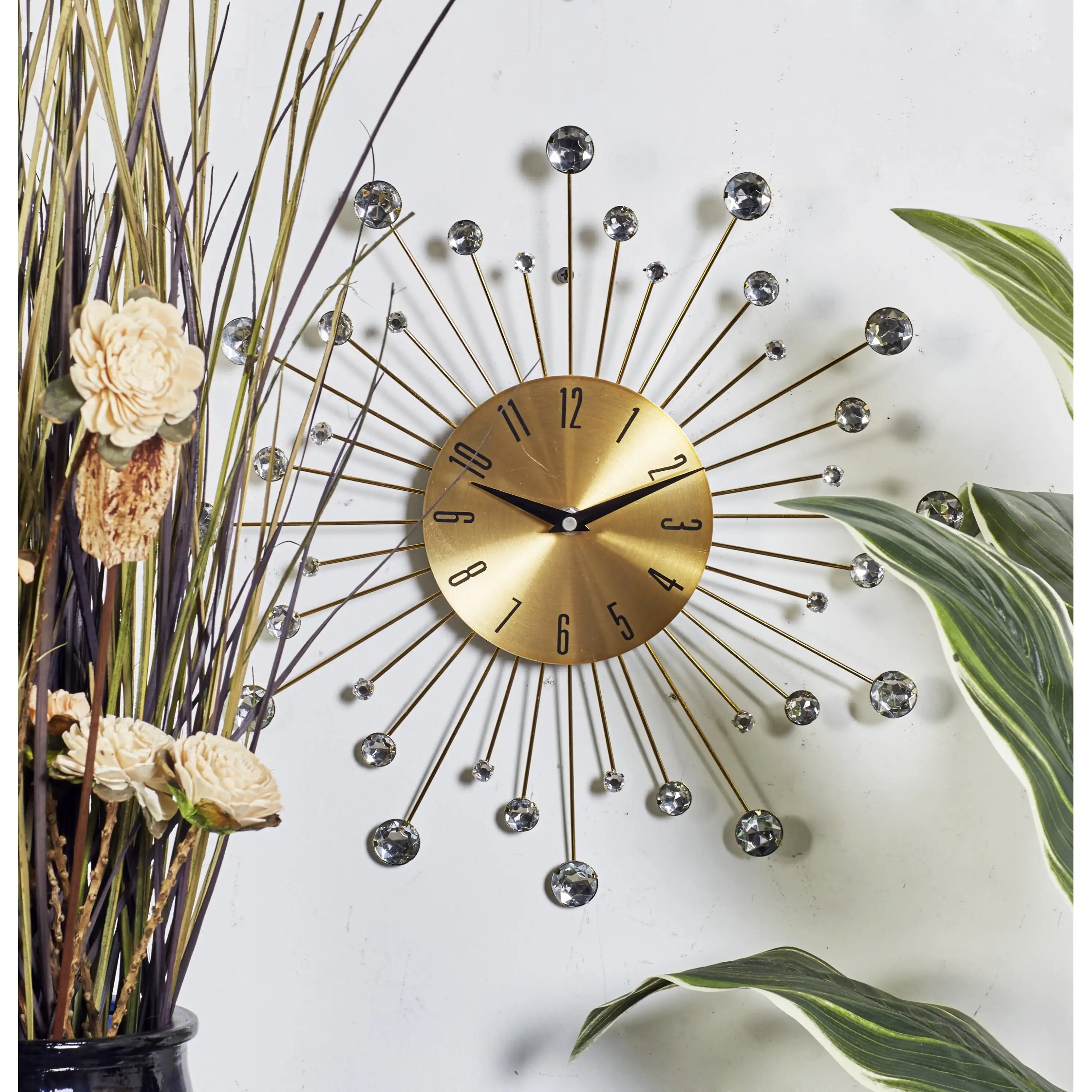 

Gold Metal Glam Wall Clock, 15” L X 0.5” W X 15” H, Features Starburst Design