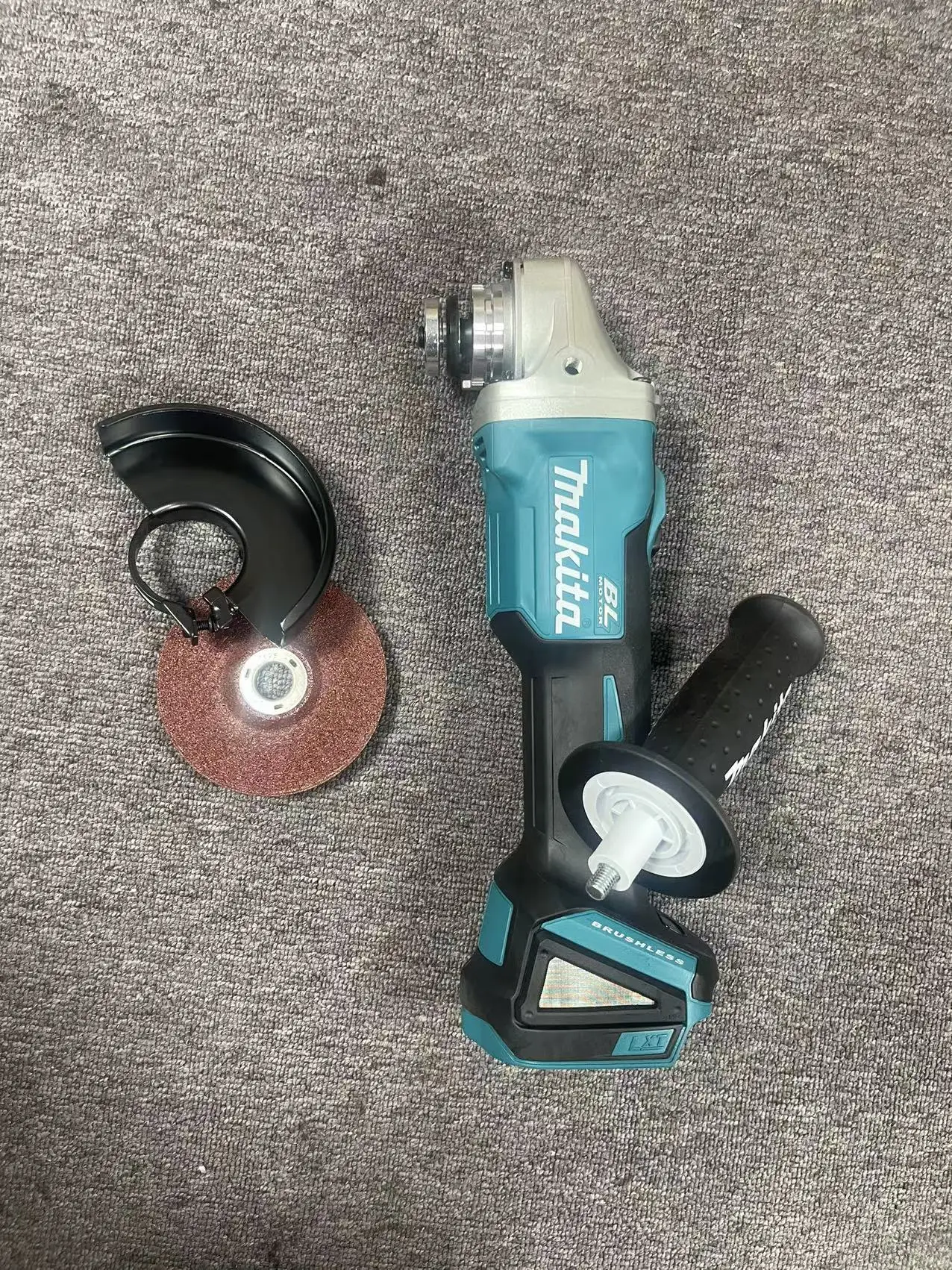 

New Makita DGA404 18V XPT BL 4" Sliding 100mm GRINDER .NEW. ONLY TOOL