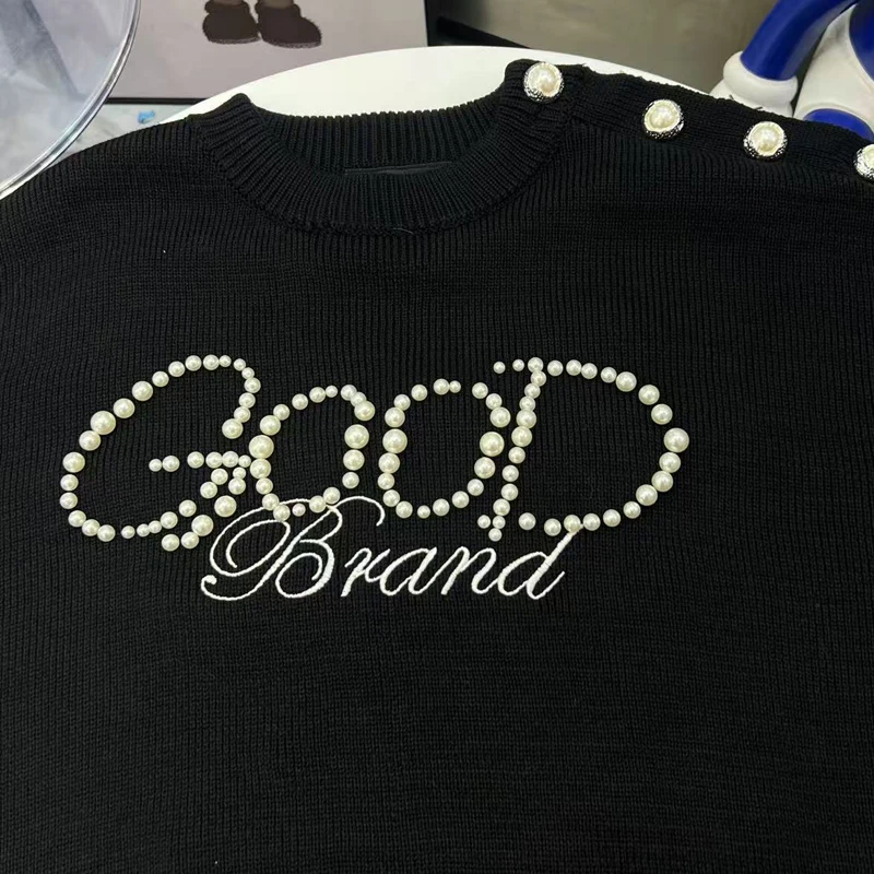 Nuevo estilo coreano buen Top Pearl Knight suéter de punto abotonado de un solo hombro cuello redondo Goodbrand pulóver suelto Casual Stock