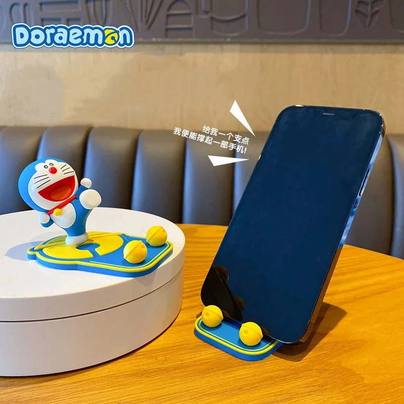 Doraemon Anime Desk Phone Holder Can Be Fixed Inside The Car Holder Silica Gel Bracket Table Toys Stand Ipad Iphone Universal ﻿