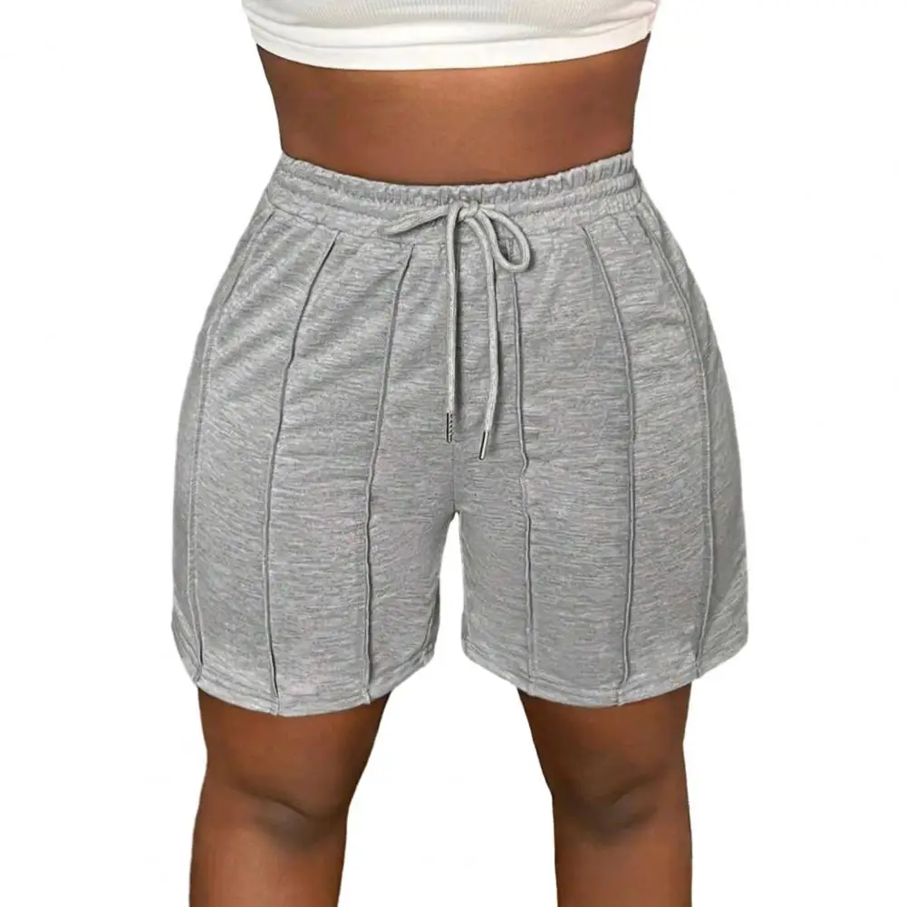 

Шорты с эластичной резинкой на талии для женщин. Стильные женские спортивные шорты с эластичным поясом для повседневных тренировок. Лето для активного отдыха.