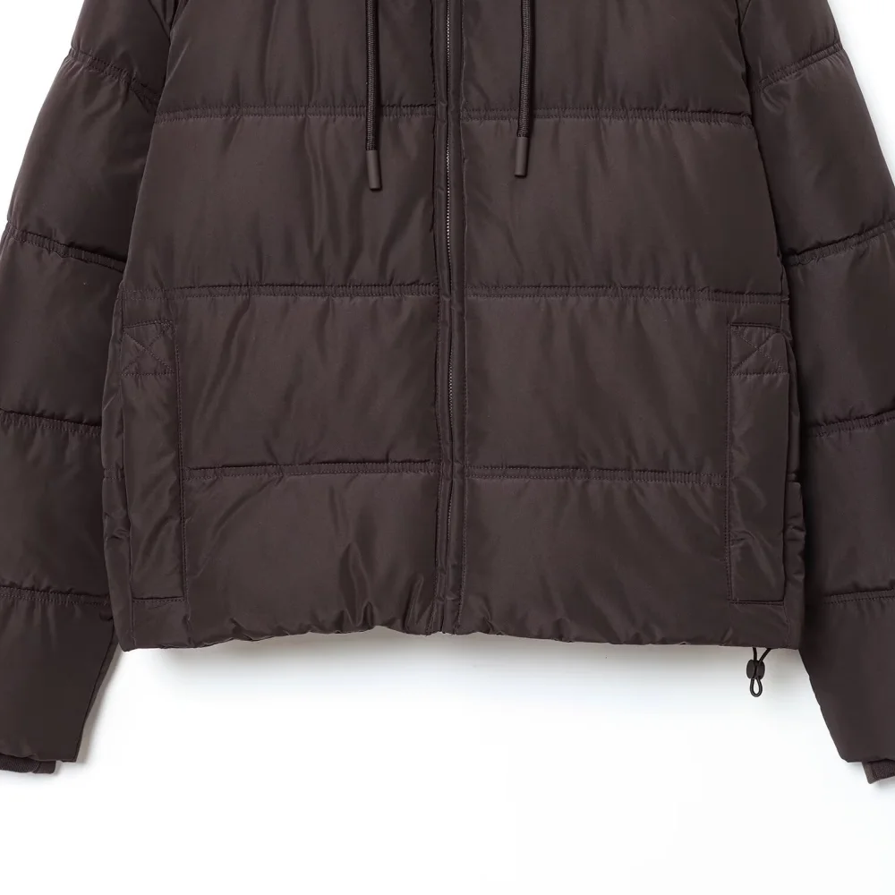 女性のシームルーズトップハイカラーパーカー長袖ジッパーストラップポケット弾性ロープ秋/冬の新しいコットンジャケット