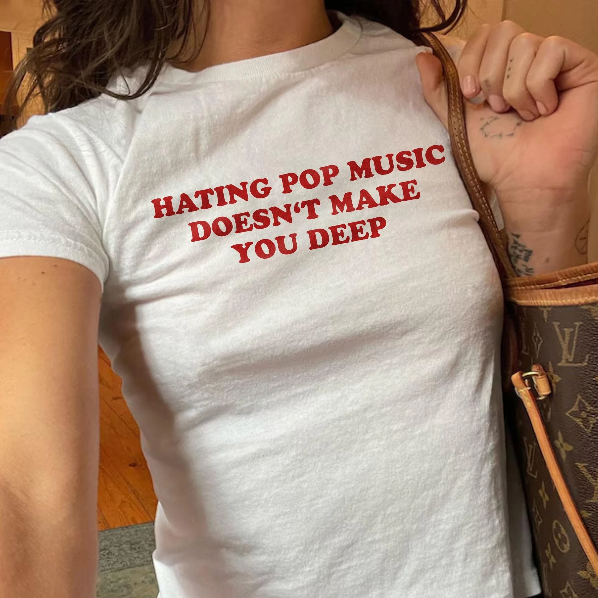 Hot Sale Y2K Baby Tee 'Hating Pop Music Doesn't Make You Deep' - Iconic Funny It Girl Shirt Cute Meme Sarcastic Tee for Her