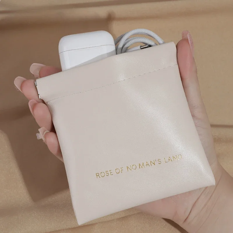 1PCS 2026 Bolsa cerrada para audífonos de PU, mini bolsa de almacenamiento para auriculares, monedero de colores, cartera pequeña, bolsa para guardar pintalabios XL01