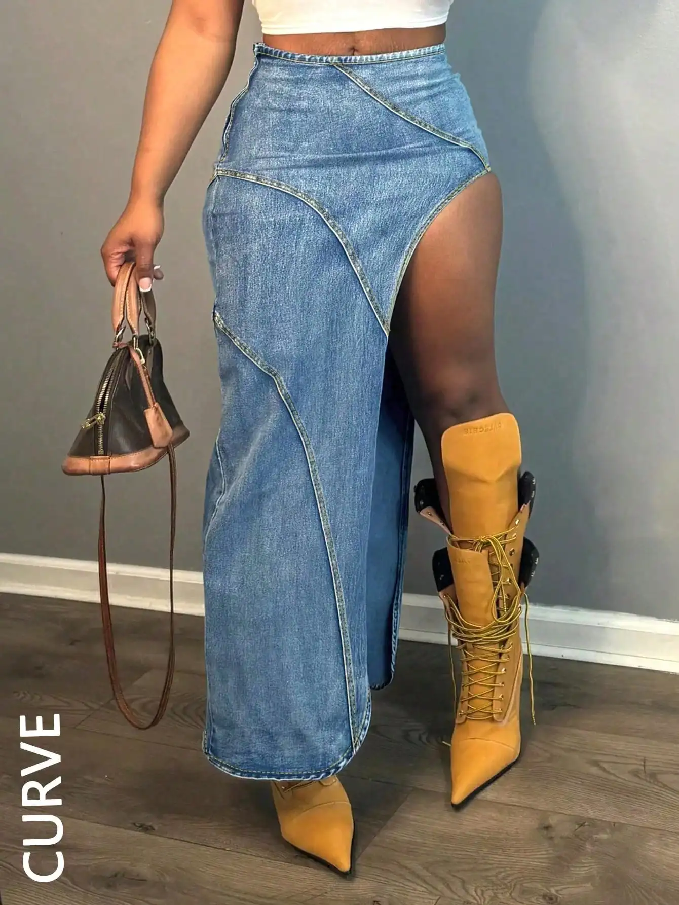 

Женская джинсовая юбка с высокой талией, асимметричным разрезом и широкими штанинами