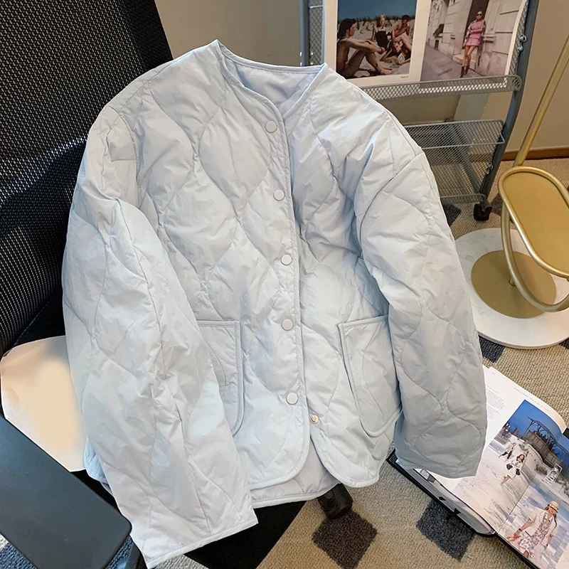 

Женская пуховая парка с желтыми вставками, секционным дизайном и раздельной конструкцией