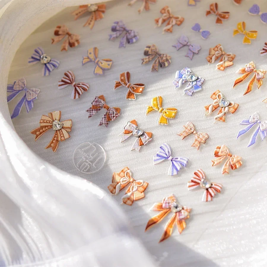 素敵な 5D ちょう結びネクタイリボンネイルアートステッカーパールカラフルなレースパールコーディングマカロンカラーシルク自己粘着マニキュアデカール