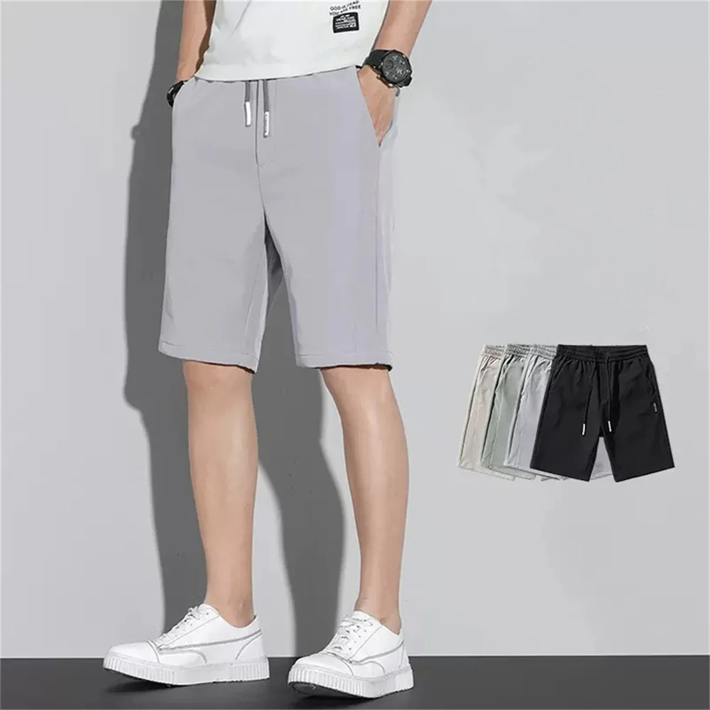 High Quality Polyester Ice Silk Shorts Men New Korean Version Of Loose Elastic Splicing Beach Five Minute Medium Pants