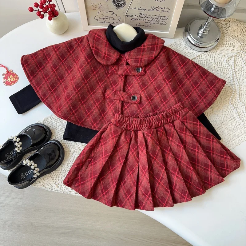 

Winter Girls' New Outfit2025Fleece-Lined Thickened Plaid Cape Shawl Top Pleated Short Skirt Two-Piece Set