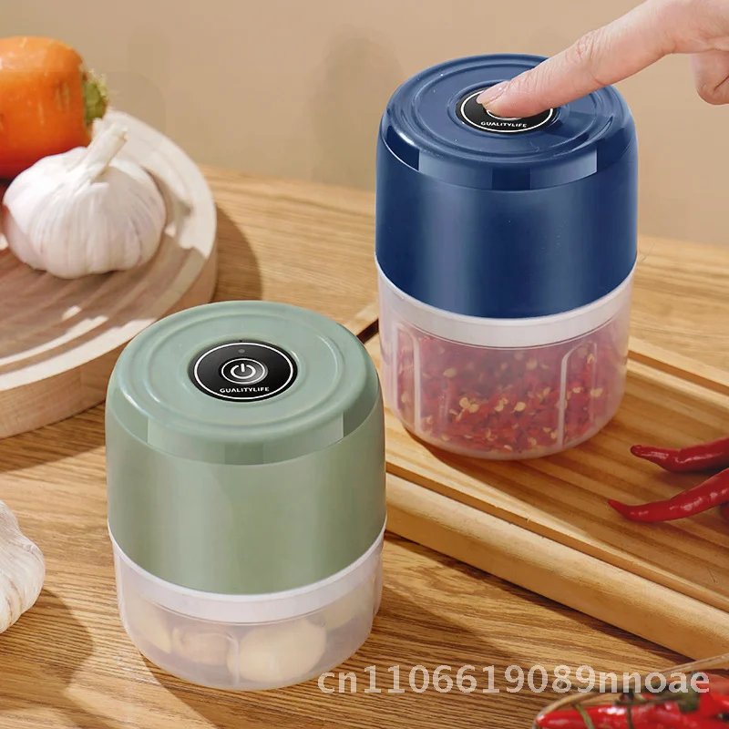 

Электрическая дробилка для чеснока, бытовой кухонный комбайн, вспомогательная машина для лопаток, синий и зеленый полипропиленовый материал, современный минималистичный дизайн