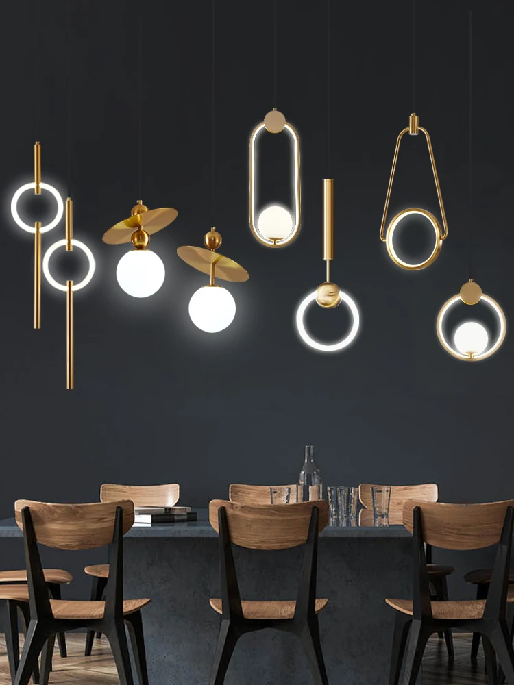 

Modern simple LED living room bedroom background wall bedside lamp Creative single head restaurant bar bubble ring chandelier