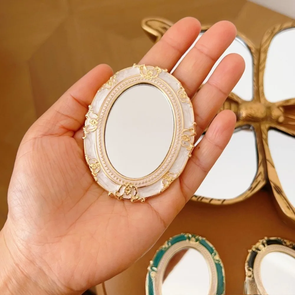 Specchio per trucco in rilievo smaltato stile europeo Specchio portatile portatile Specchi cosmetici da corte retrò squisiti per donne e ragazze
