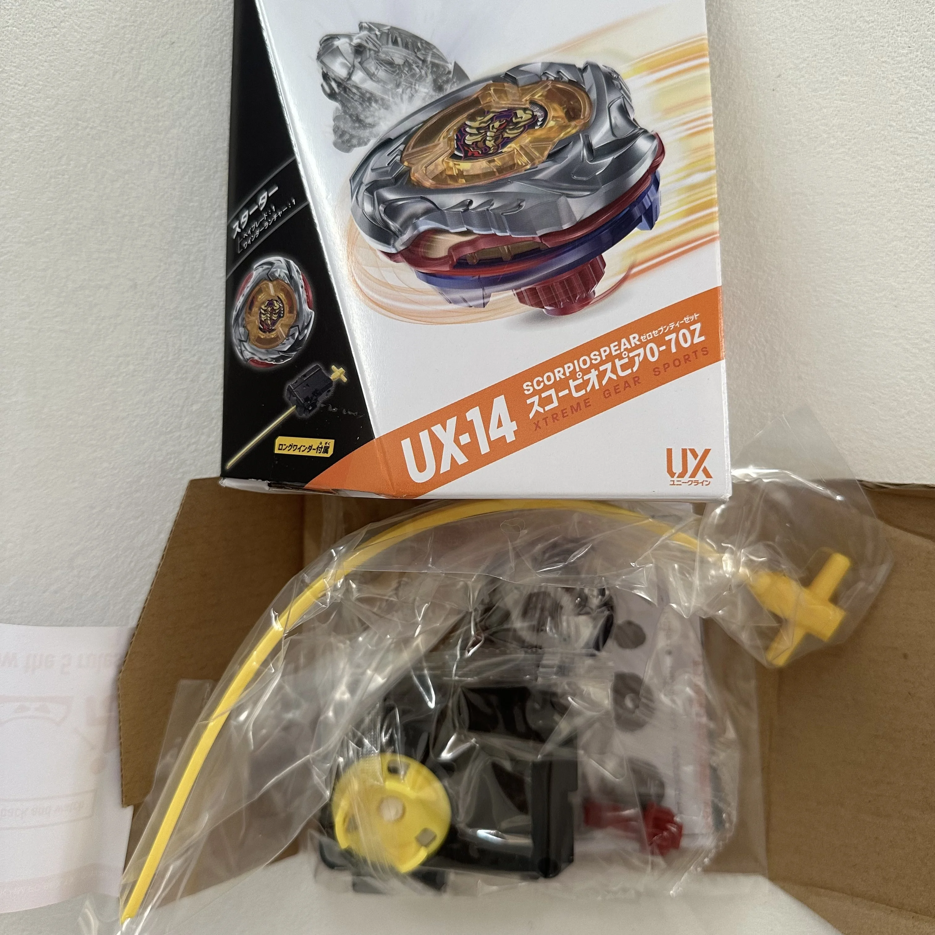 

GENUINE beyscollector X Beys UX-14 Scorpio Spear 0-70Z Battling Tops X Starter New with original packaging set