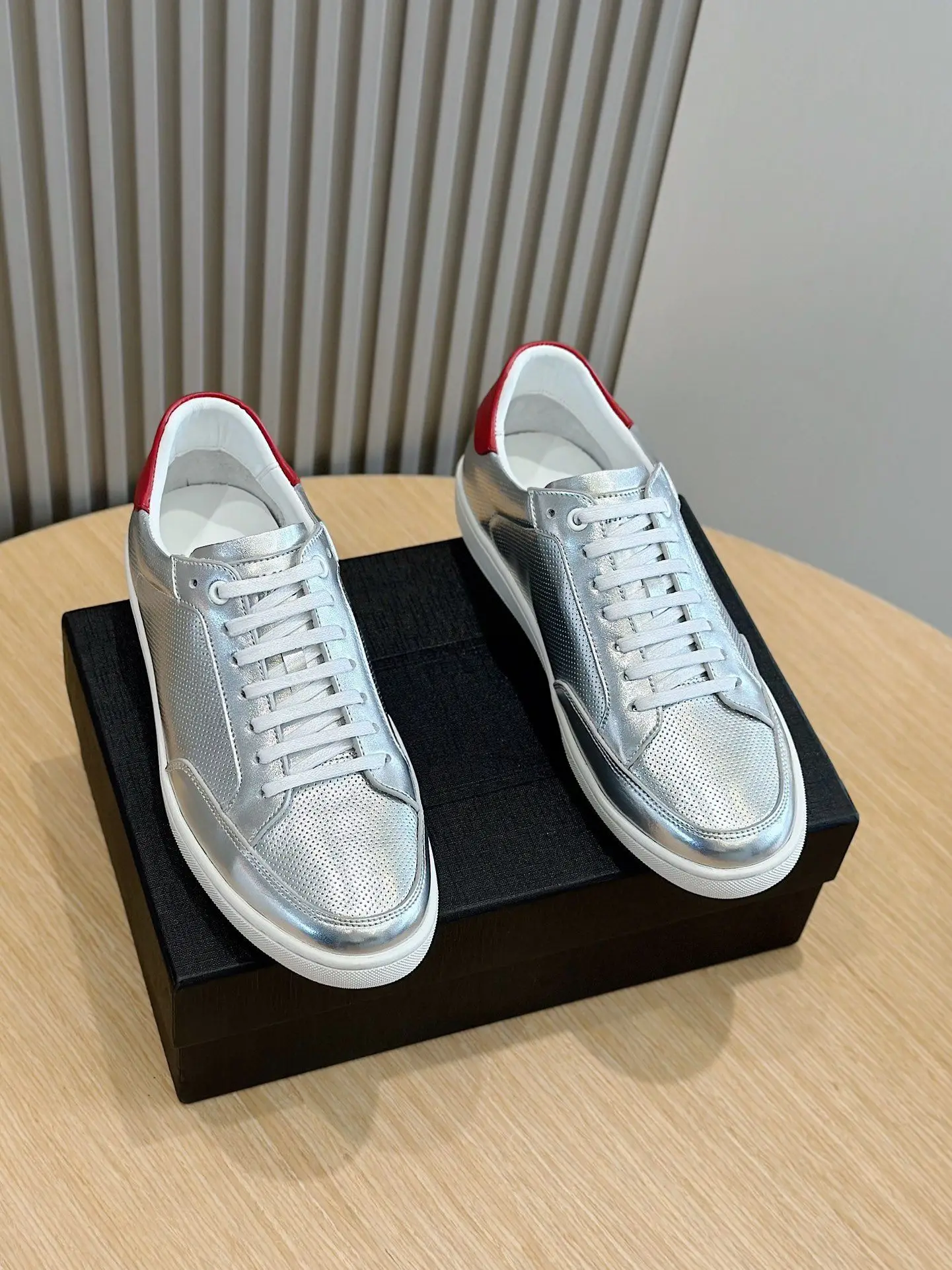 Unisex Low Top Casual Sneakers Silver Metallic Perforated Leather With Red Heel Patch Lace Up White Sole Walking Shoes