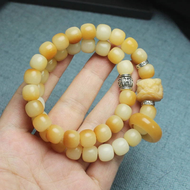 

Brown gradient Bodhi root barrel beads lion dance bracelet with running ring and six-character mantra for men and women