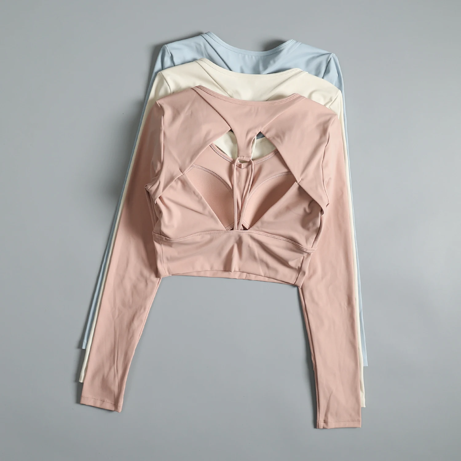 

Yoga clothes with chest pads for women high-end Pilates training fitness tops slim high-looking beautiful back sports long