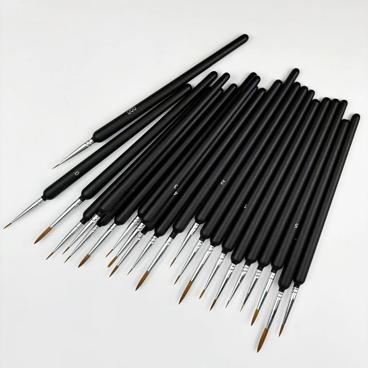 

A set of 22 fine detail brushes with wooden handles, suitable for miniature art, acrylics, and watercolors, ideal for artists