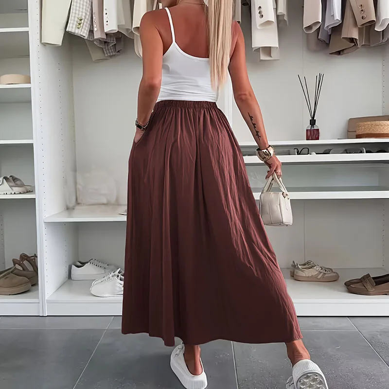 الصيف البوهيمي الشاطئ المرأة تنورة الشارع الشهير عادية بلون مكتب تنانير للسيدات 2025 الربيع عالية الخصر فضفاض ألف خط تنورة