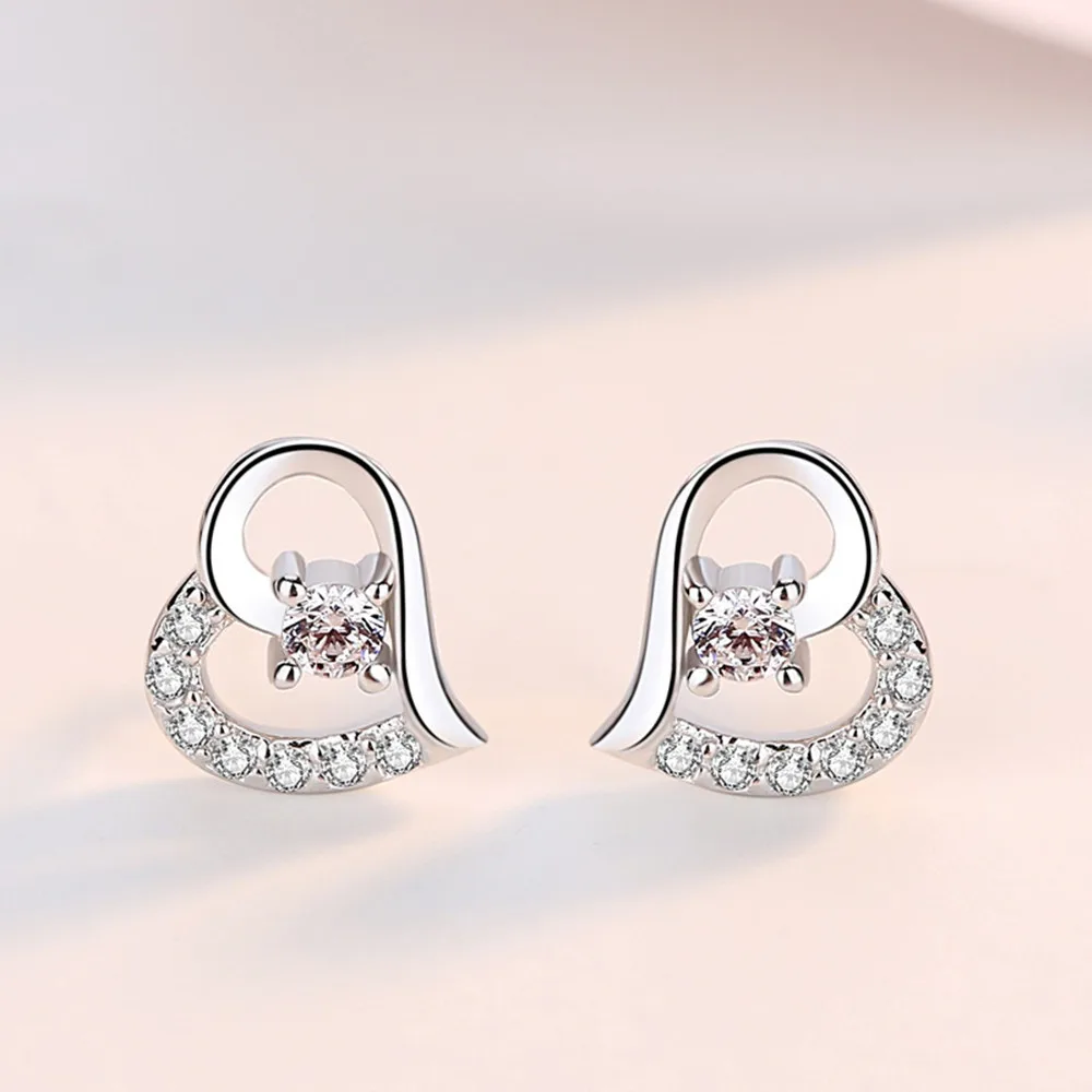 

CHSHINE 925 sterling silver New Ladies Fashion High Quality Jewelry Crystal Zircon Hollow Heart Stud Earrings