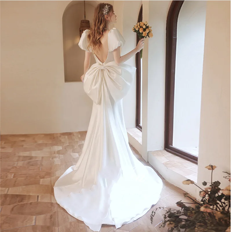 Abito formale con maniche a sbuffo abiti da sposa a sirena in raso Vintage abiti da sposa con fiocco senza schienale principessa vestido de festa de casamento