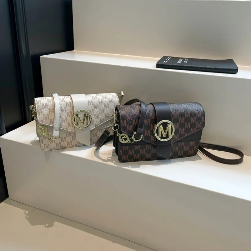 Borsa a tracolla da donna sofisticata realizzata in pelle con stampa Jaguar Varsaviazione vintage spaziosa morbida stile quotidiano ​