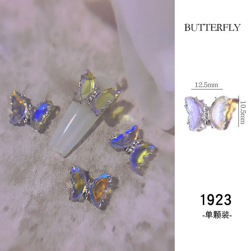 4PCS 2022ใหม่เล็บ Art Illusion คริสตัลผีเสื้อ INS ลมสเตอริโอ Ice ผ่าน Aurora เจาะโลหะเล็บ DIY อุปกรณ์เสริมเล็บ beaut