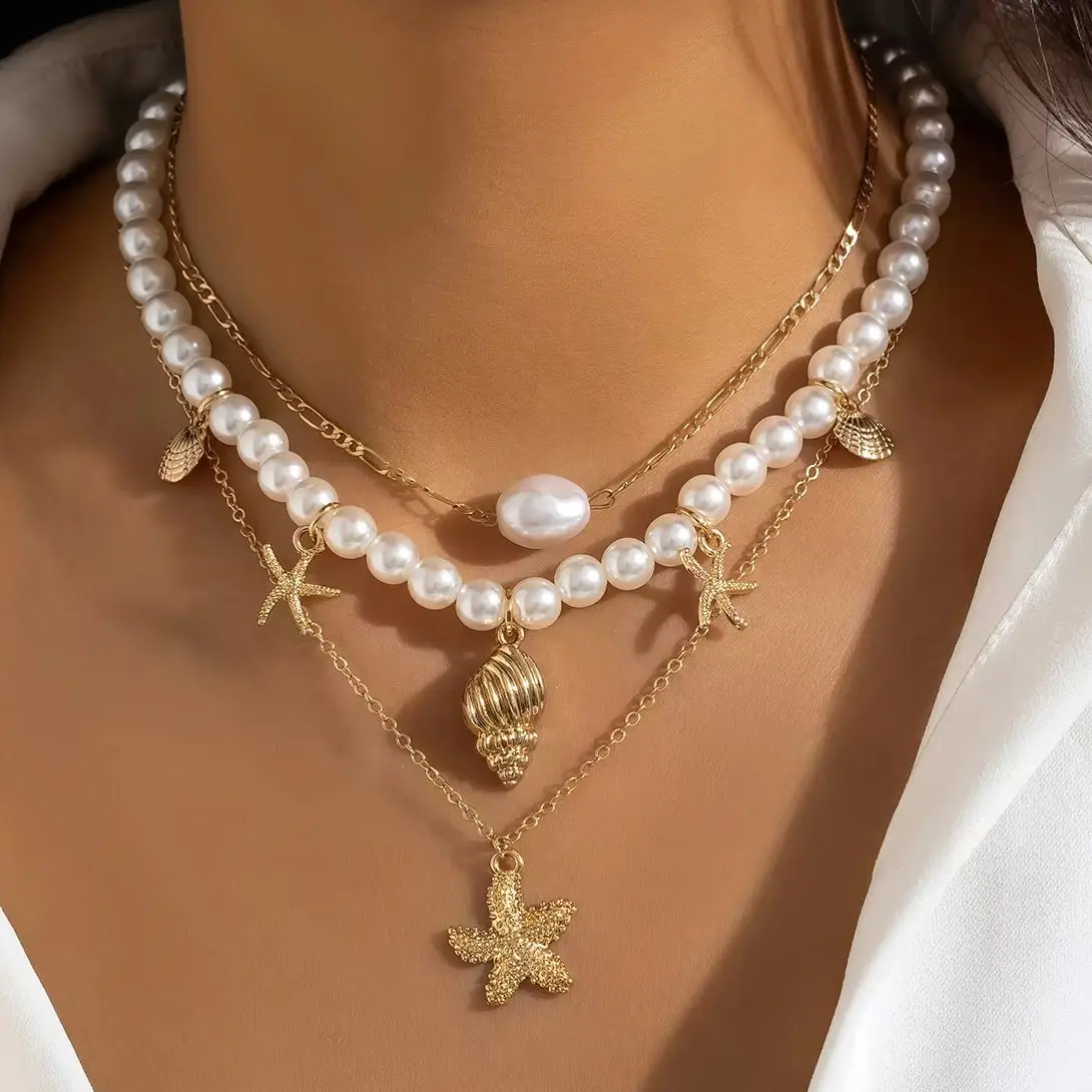 PuRui Colar com pingente em forma de estrela do mar, cor dourada, imitação de pérola, gargantilha com contas para mulheres, joias vintage, colar de festa para meninas