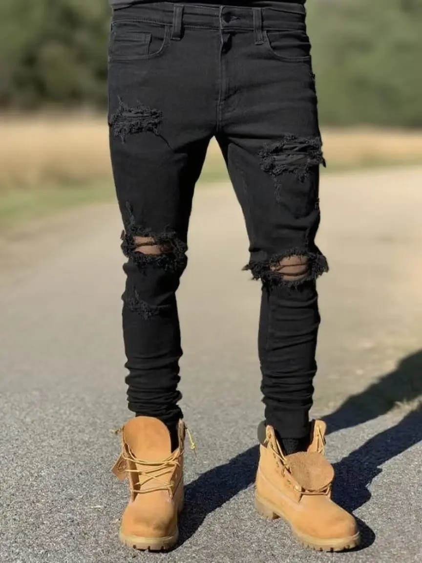 

Мужские черные рваные джинсы скинни — потертый хип-хоп уличный стиль, легкие облегающие джинсовые брюки