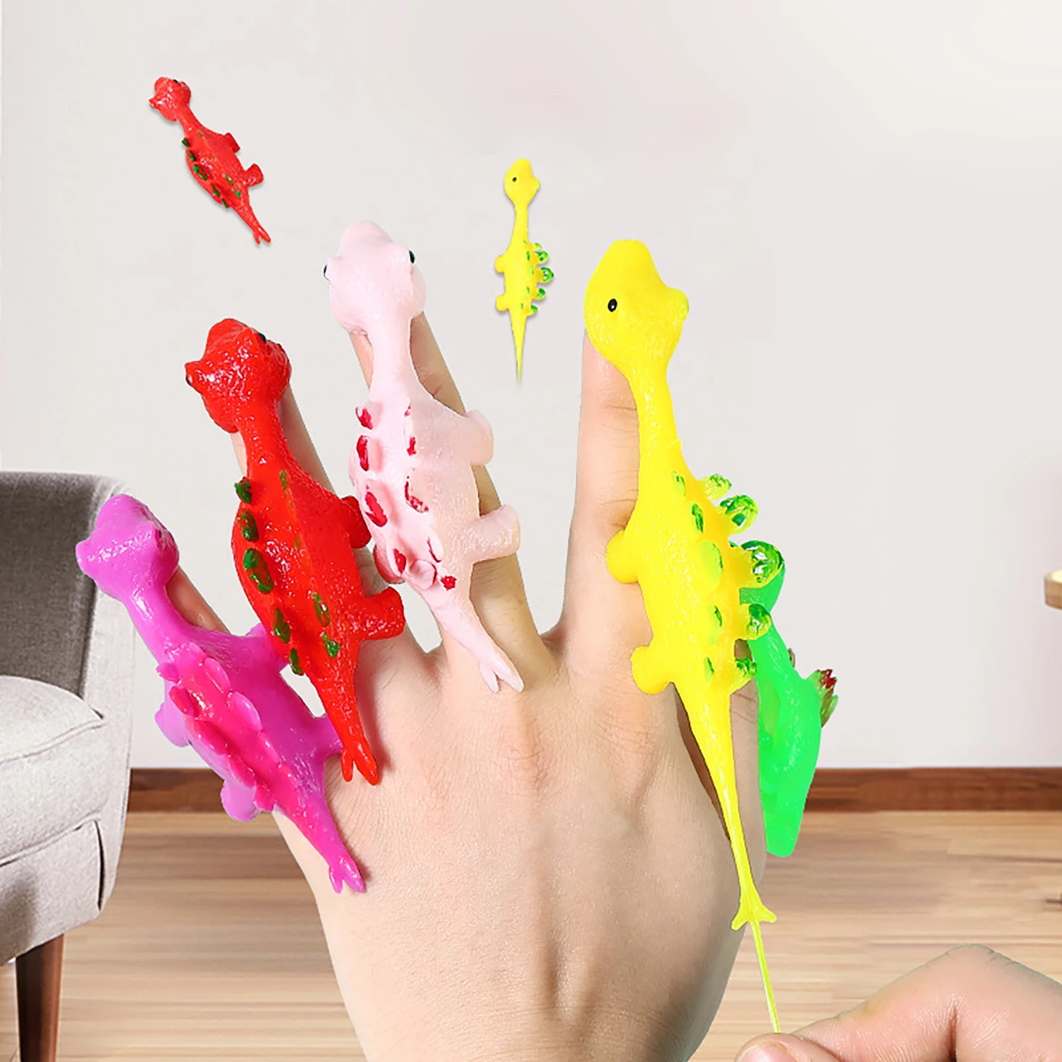 Dita di dinosauro da tiro, lancio di freccette divertenti, lancio di giocattoli per bambini di dinosauro, regali, decompressione