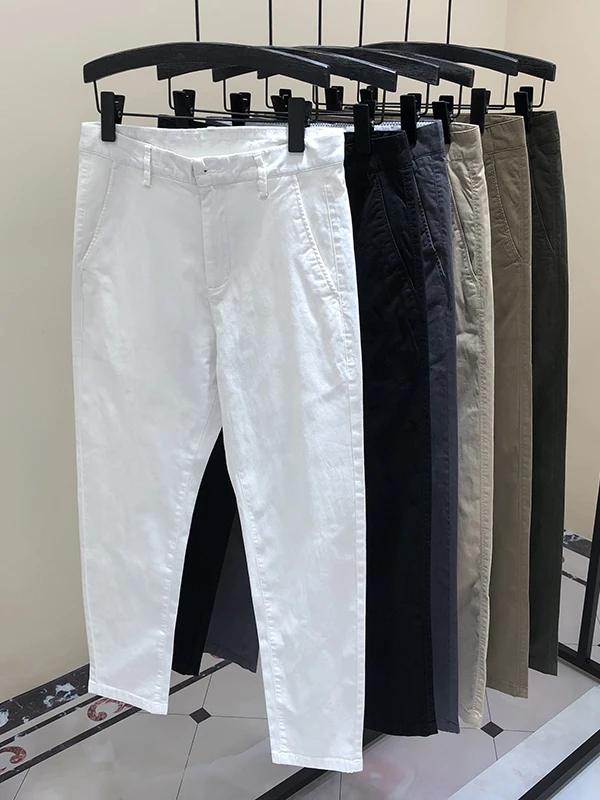 

Повседневные летние тонкие мужские белые девятисекционные брюки в Корейском стиле, модные молодежные активные зауженные леггинсы из смеси хлопка