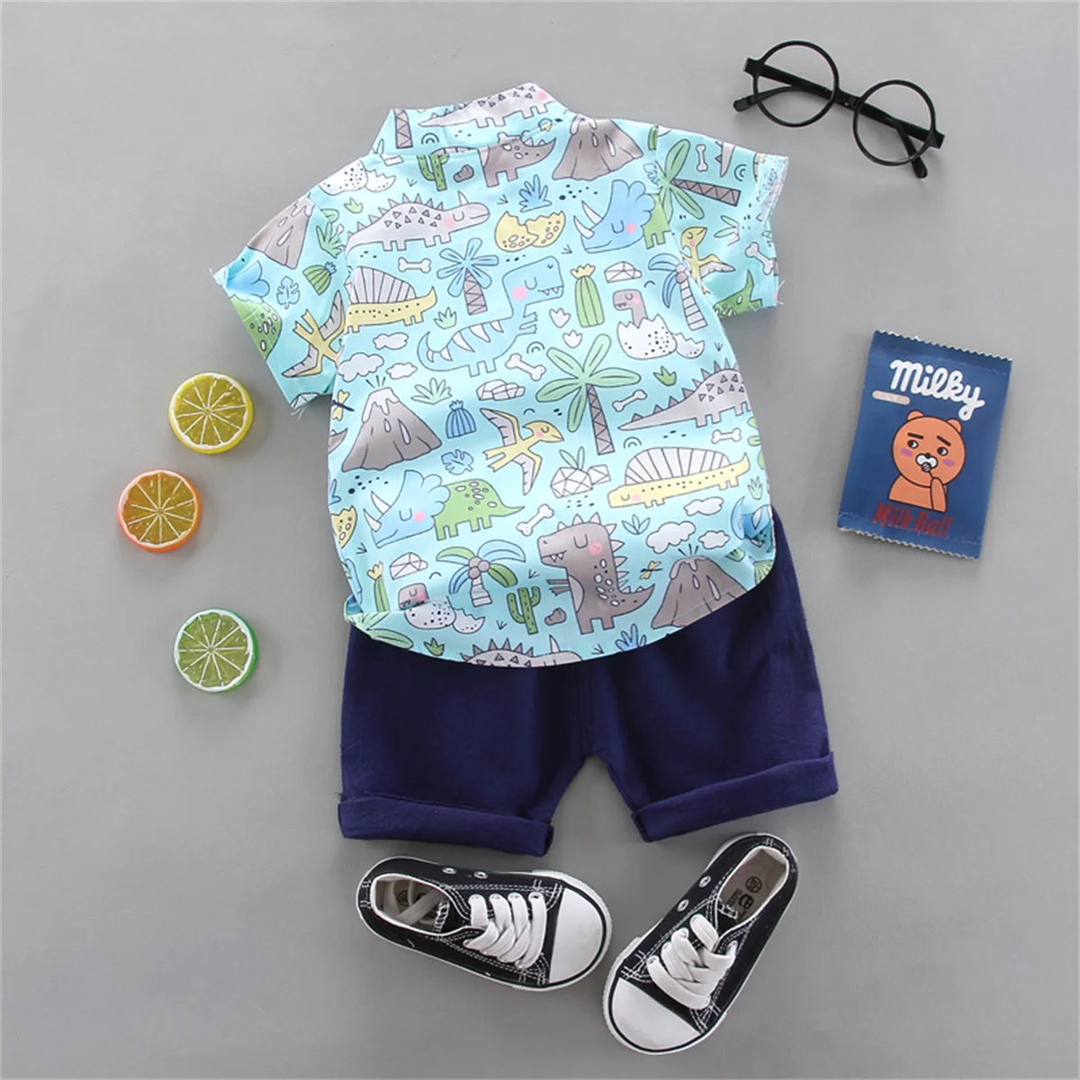 2PCS Infant and Toddler Summer Fashion Full Body Cartoon Dinosaur Coconut Tree Pattern Random Print Pocket Shirt Shorts Set