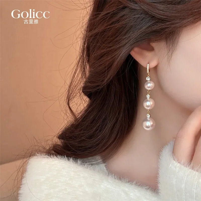 Diamond-encrusted pearl fringed earrings women's 2024 new popular unique temperament stud earrings long light luxury