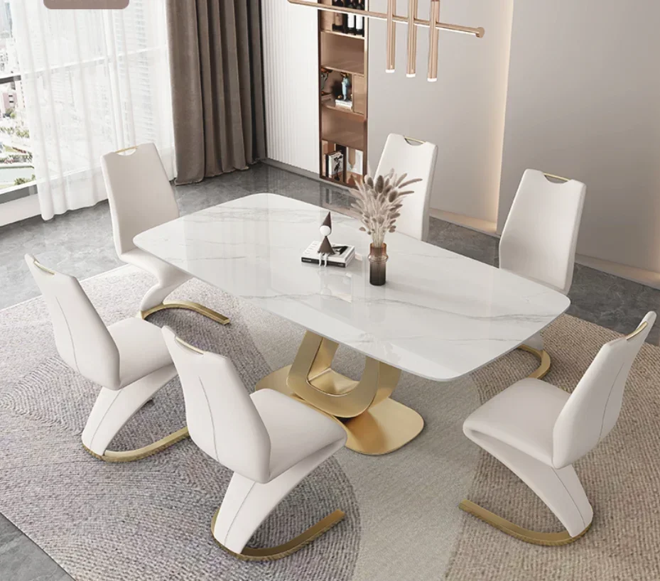 

#s Rock-slab dining table and chair combination modern simple light luxury high-end dining table stainless steel new dining tabl