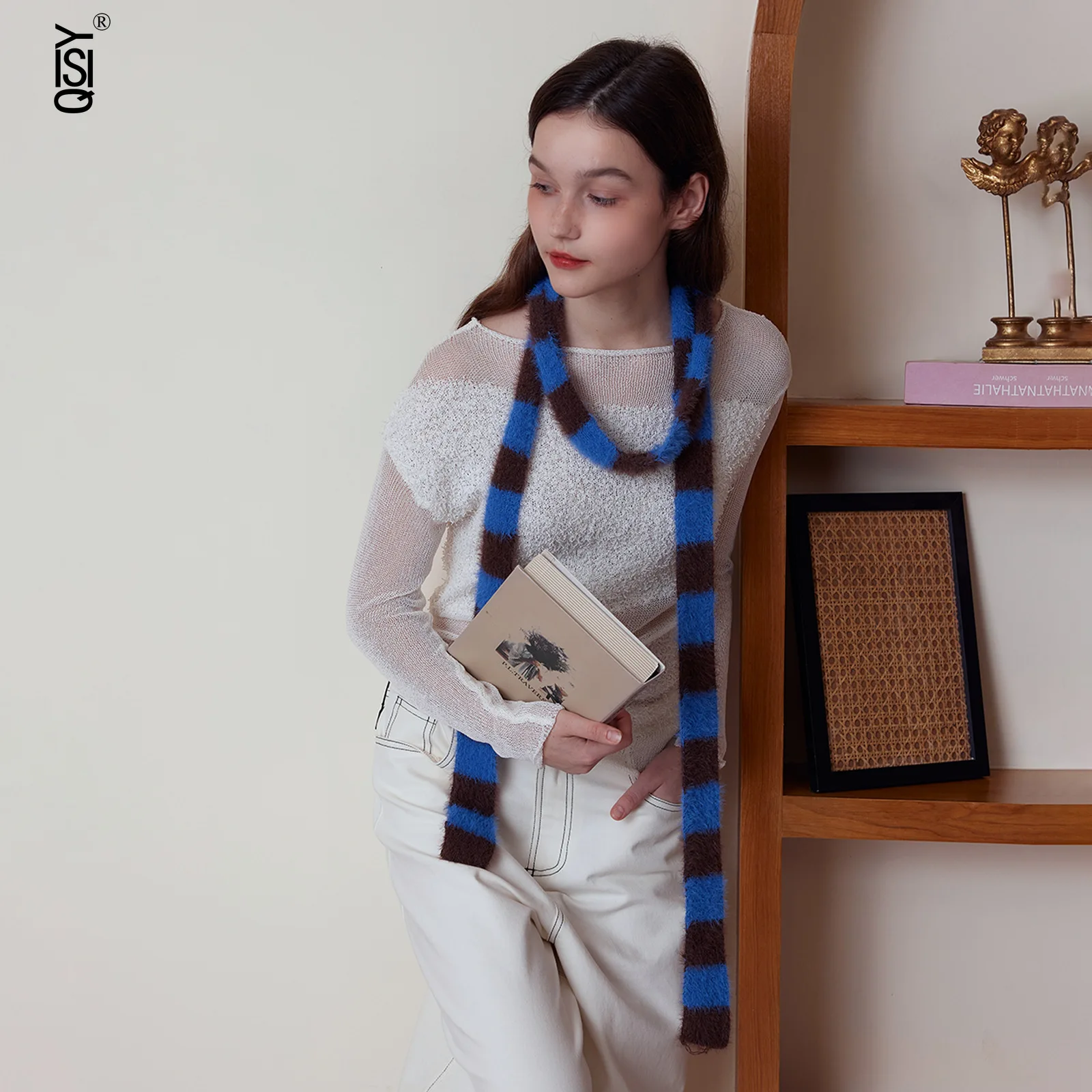 

A Fluffy, Narrow Striped Warm Knitted Scarf for Women To Pair with A Hot Girl's Neck in Winter