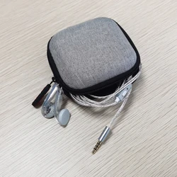 QIGOM Classic nostalgic silver-plated wired earphones with microphone for vocals, featuring a flat-head design
