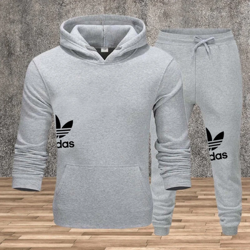 

Men's fitness fashion jogging sportswear set for autumn and winter, featuring a two-piece pullover hoodie and casual pants