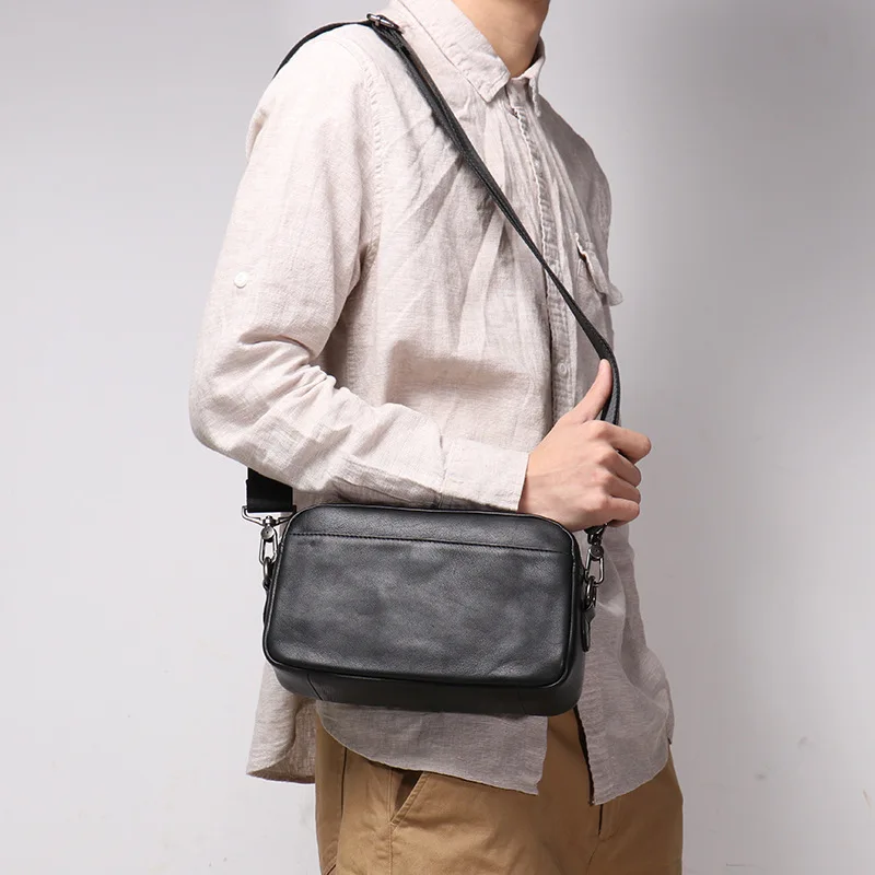 

2024 Men's Leather Shoulder Bag Women's Cowhide Crossbody Small Backpack Large Capacity Clutch Bag Grab Mobile Phone Bag